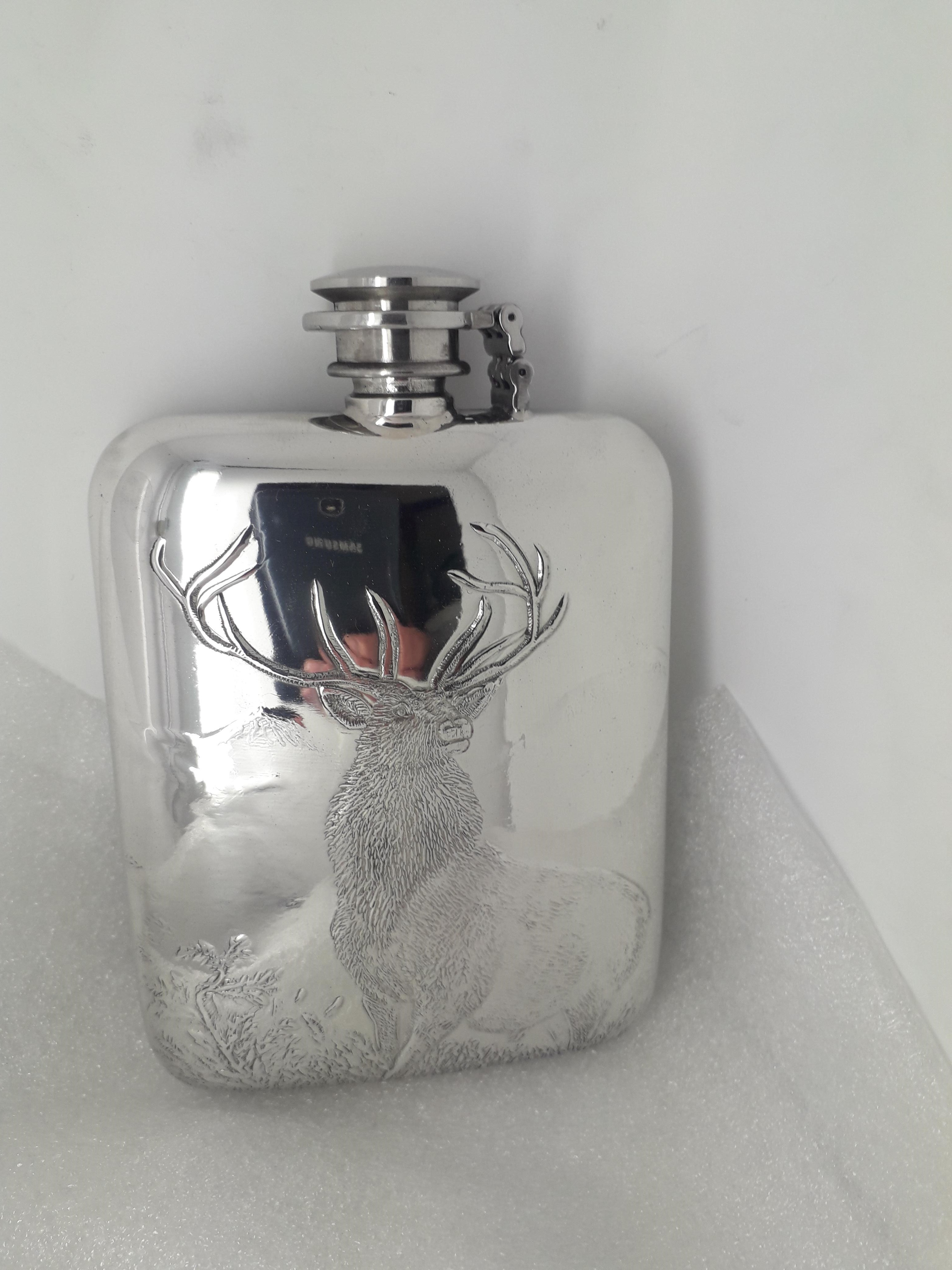 F144 6oz stamped flask embossed Monarch of the glen